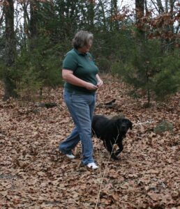 Dawn walking her lab, Abby.
